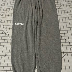 Spiritual Gangster. Sweatpants, very soft. Size small with “Good Karma”